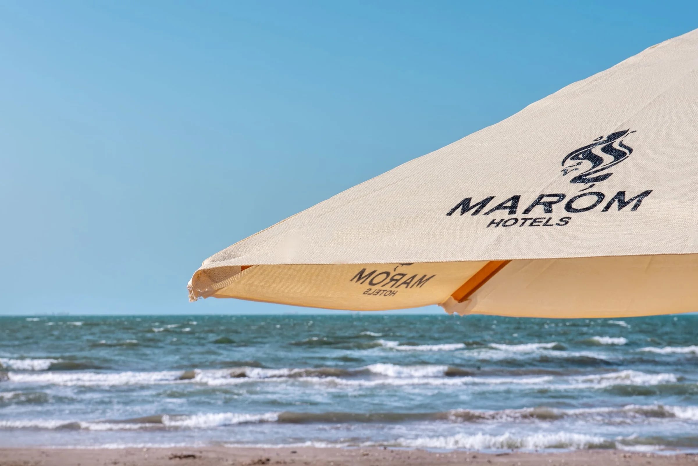 A Marom umbrella on the beach