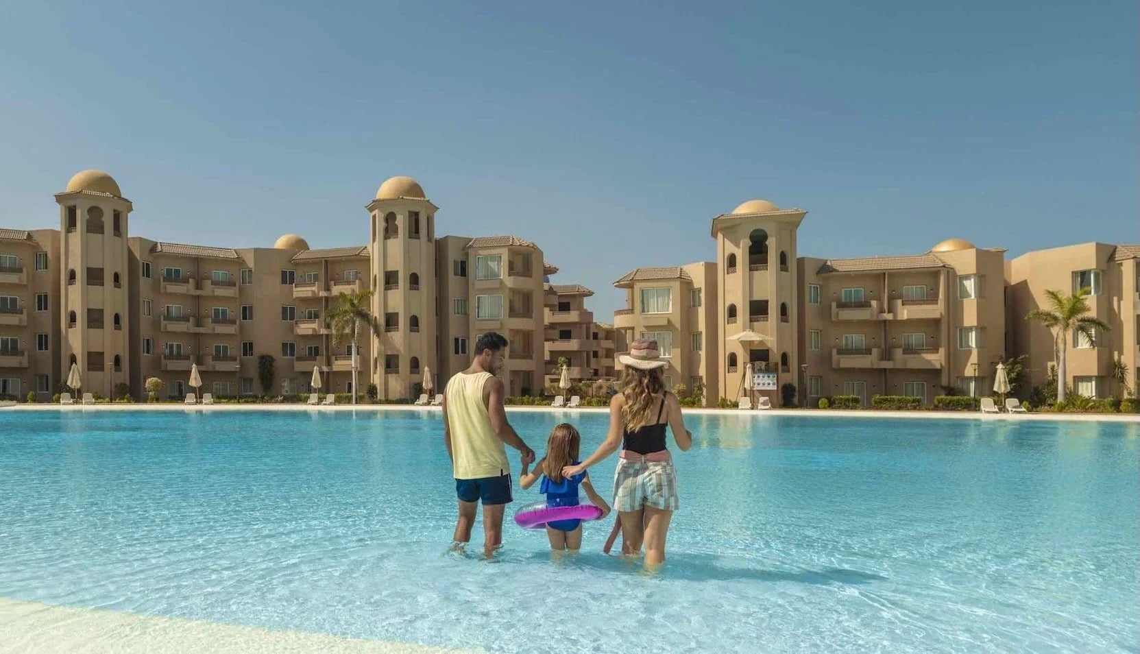 Guests in the lagoon at Marom Port Said Resort